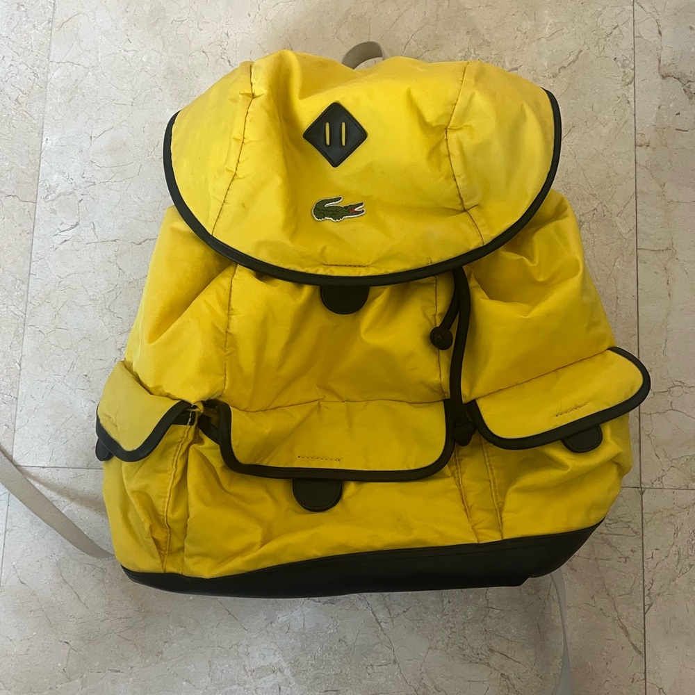 Lacoste Yellow and Black Backpack with Sporty Design